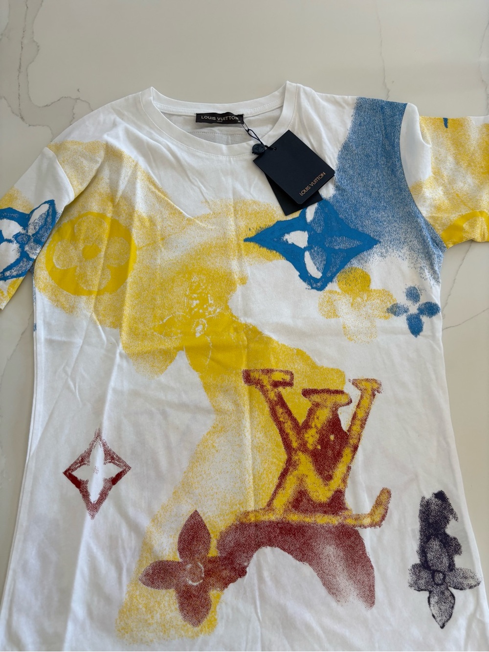 LV women’s White Tee with Yellow, Blue & Brown Logo Graphics